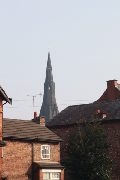 image of house with St Matthews church spiire in the distance