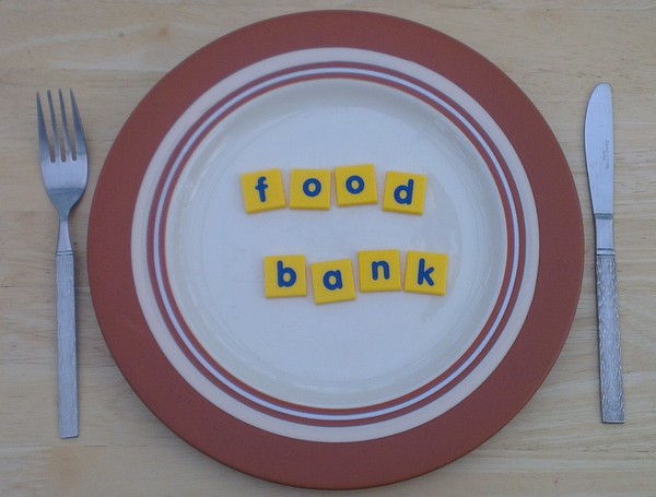 image an empty plate with food bank written on it